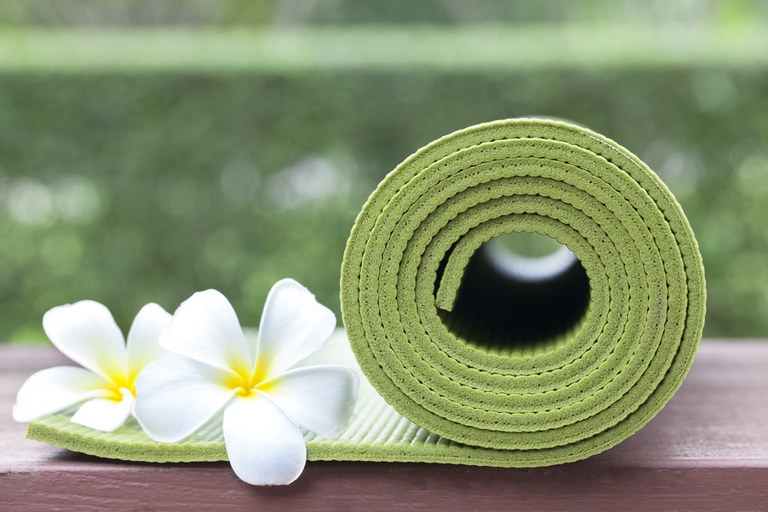 yogamat met bloemen